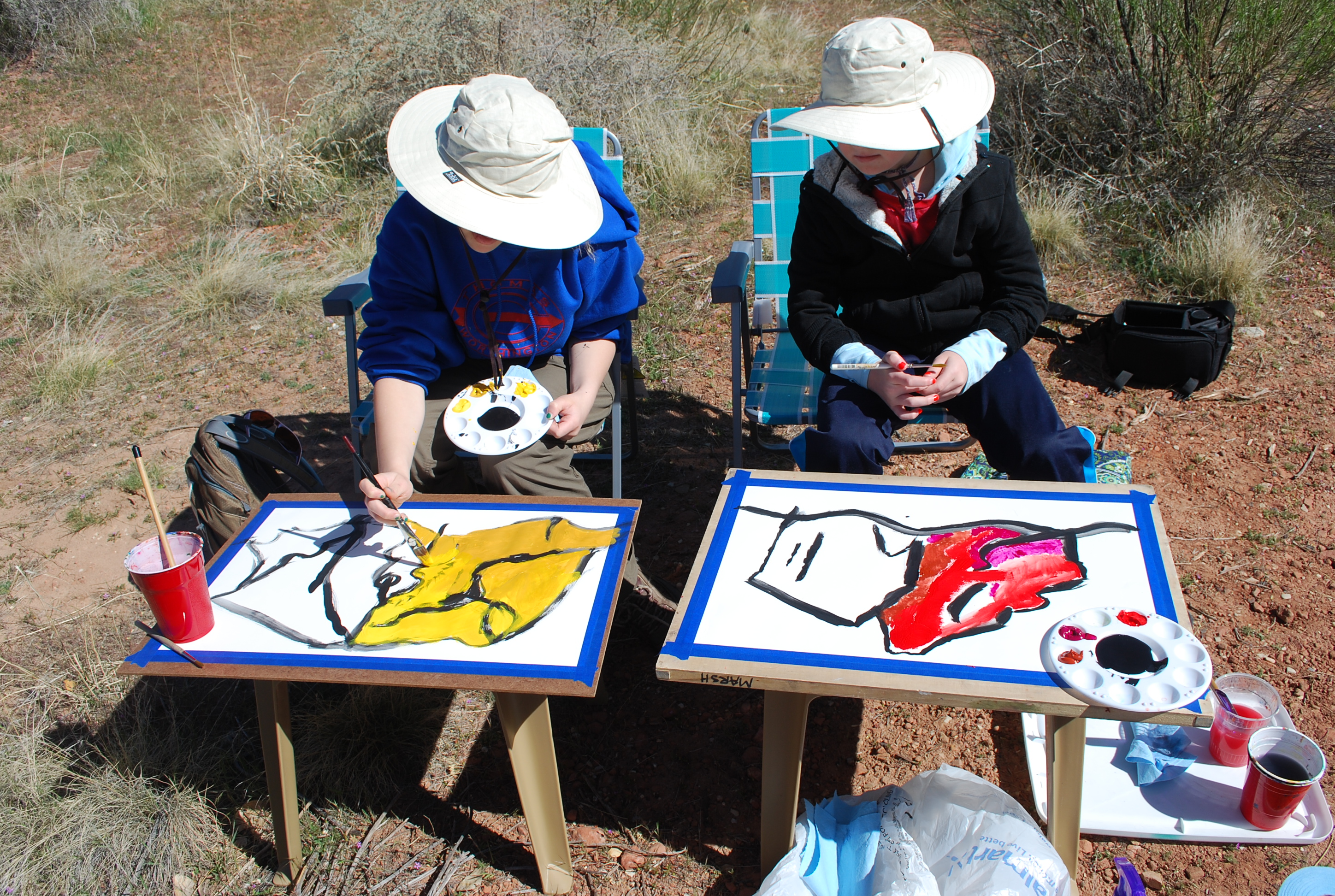 Working with two young artists in Zion National Park. An Art Project that begins with a Black Line.