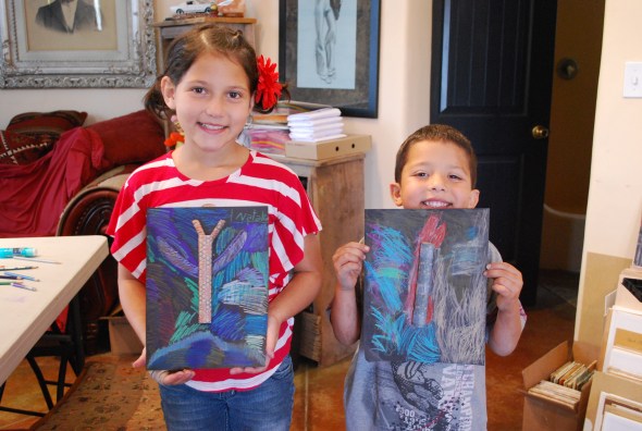 The textures of the butterflies' wings are pastel pencil, prismacolor pencil, and chalk on black cardstock paper.